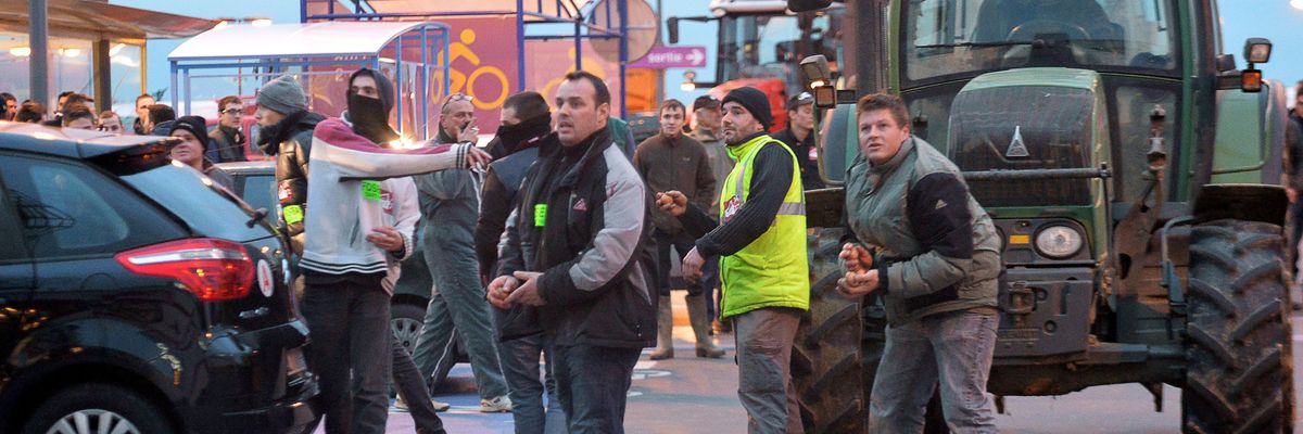 French farmers throw eggs at police.