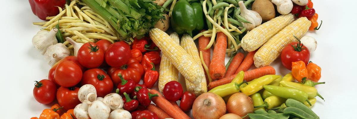 Fresh vegetables on a white background.