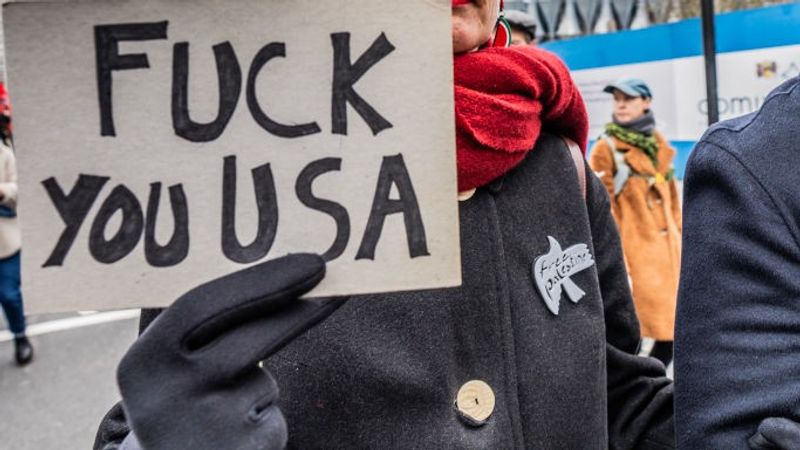 "Fuck You, USA" sign says