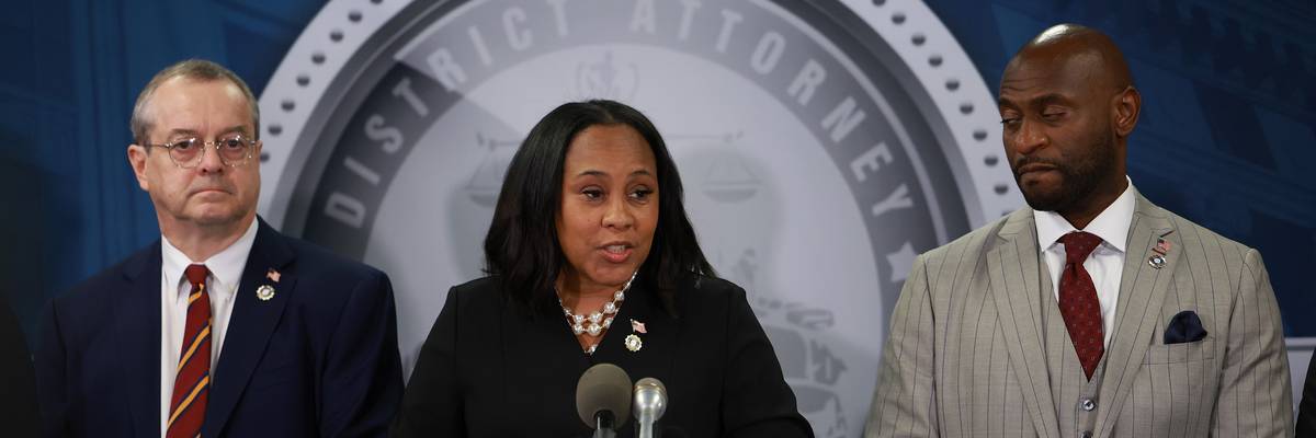Fulton County District Attorney Fani Willis speaks during a news conference