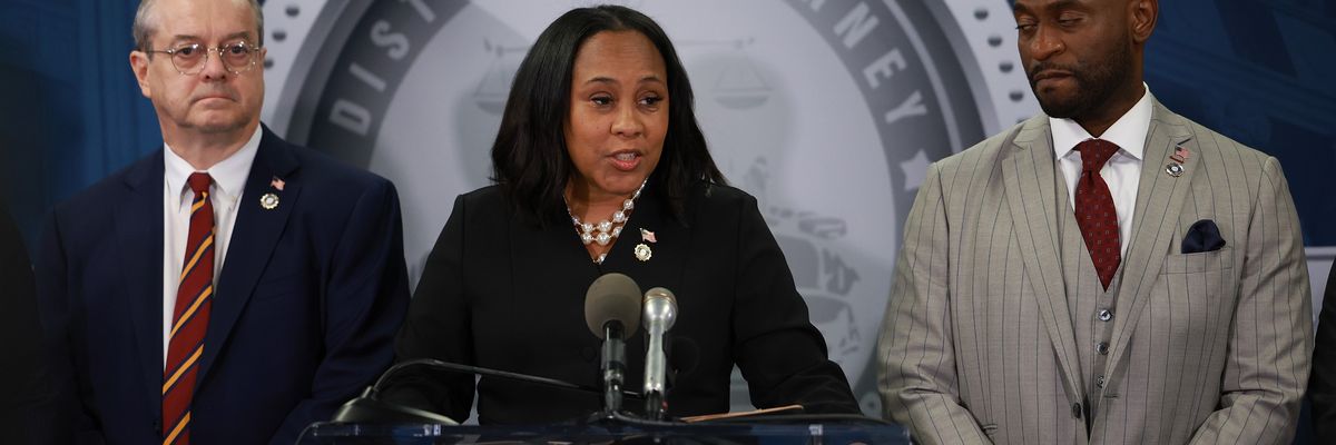 Fulton County District Attorney Fani Willis speaks during a news conference