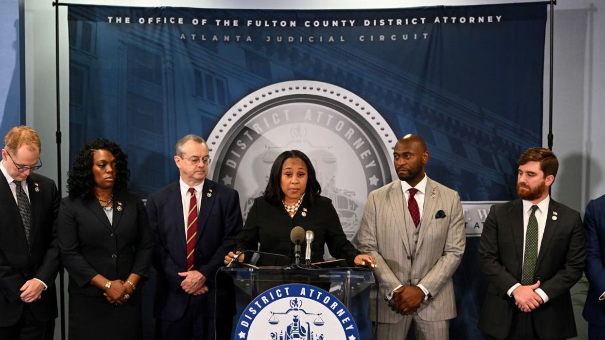 Fulton County District Attorney Fani Willis speaks during a news conference.