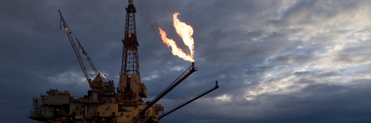 Gas flares from a drilling rig off the Gulf of Alaska