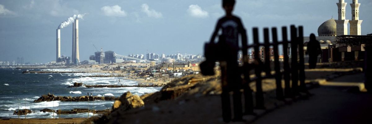 Gaza City in foreground, Ashkelon port in background