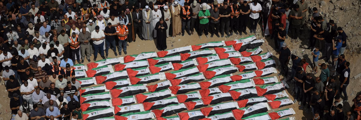 Gaza holds mass burial for more than 100 Palestinians recovered from Yarmouk rubble