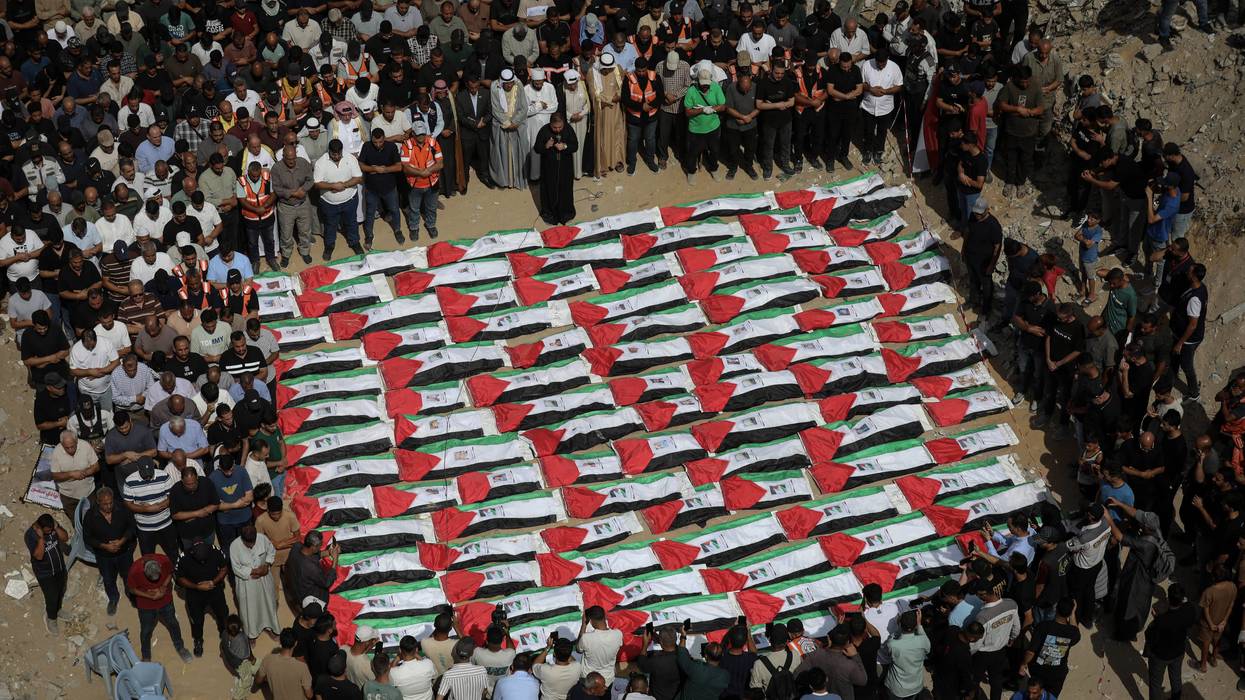 Gaza holds mass burial for more than 100 Palestinians recovered from Yarmouk rubble
