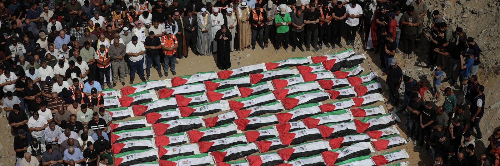 gaza-holds-mass-burial-for-more-than-100-palestinians-recovered-from-yarmouk-rubble.jpg?id=68416597&width=1200&height=400&coordinates=0%2C462%2C0%2C1205