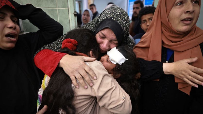 Gaza women and girls mourn relatives killed in an Israeli airstrike