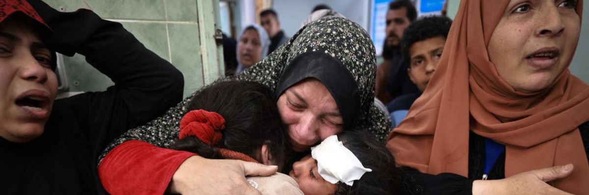 Gaza women and girls mourn relatives killed in an Israeli airstrike