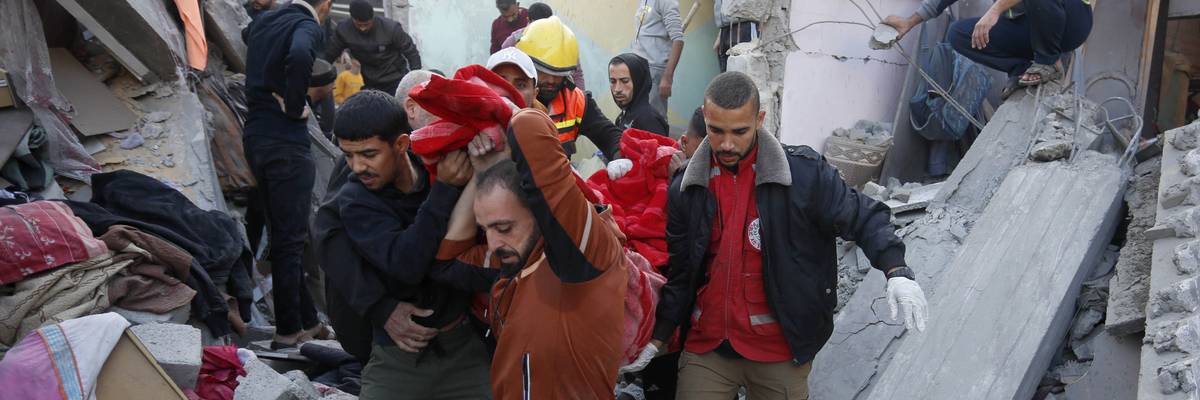 Gazans search rubble of building