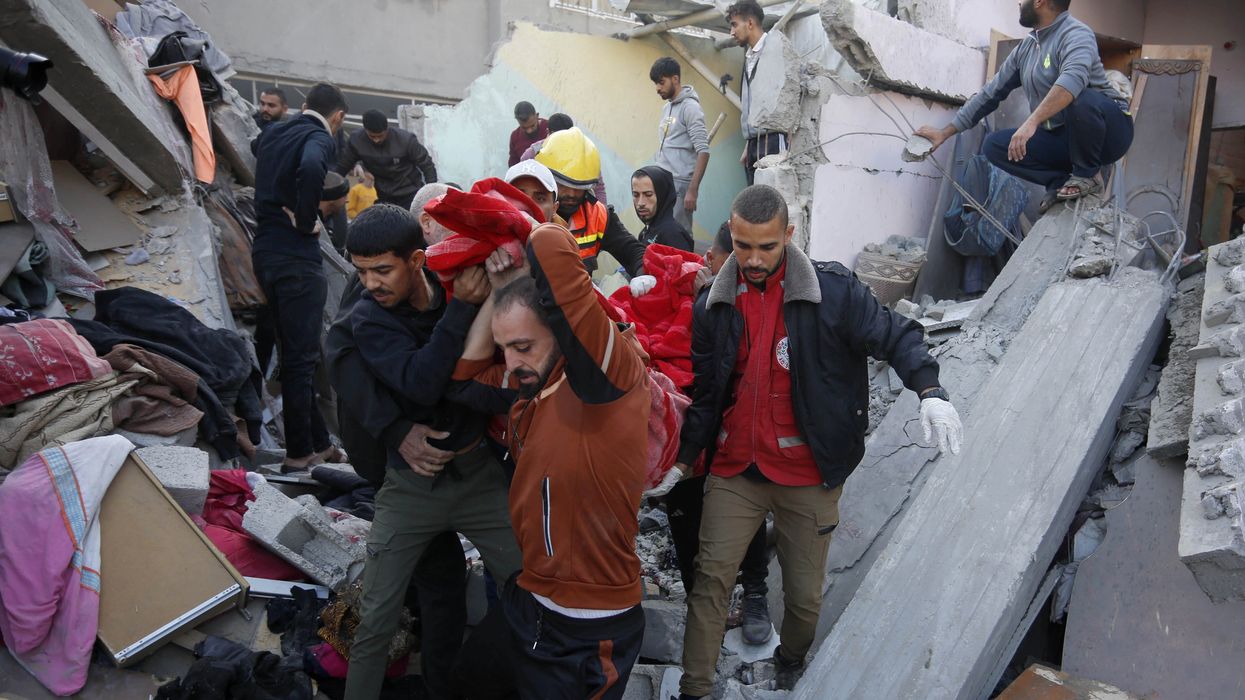 Gazans search rubble of building
