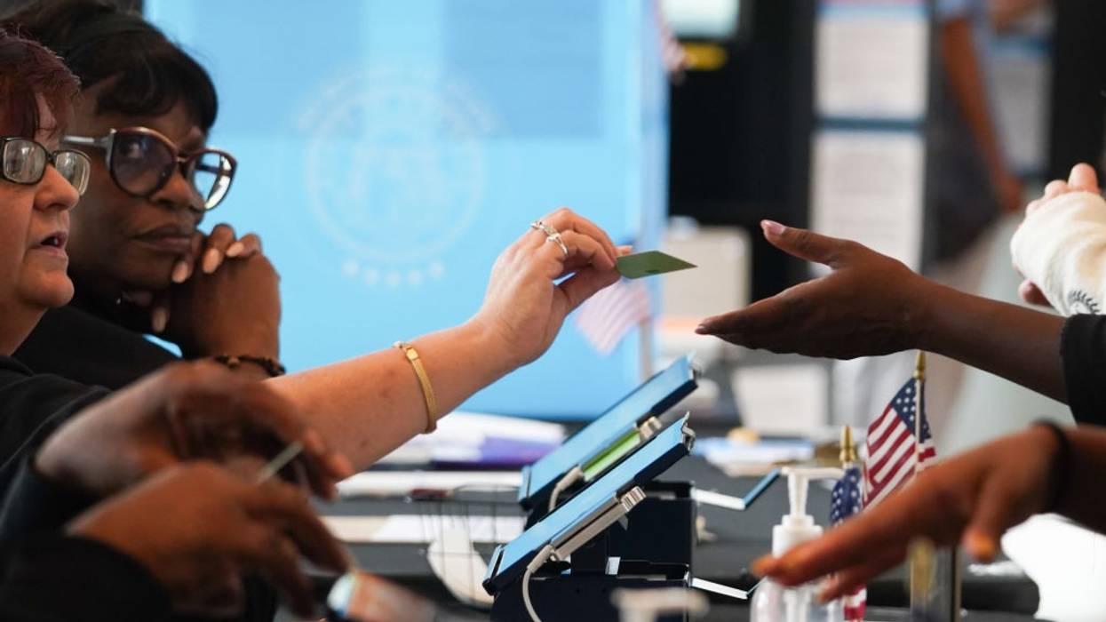 Georgians Head To The Polls On Last Day Of Early Voting Ahead Of Tuesday's Election