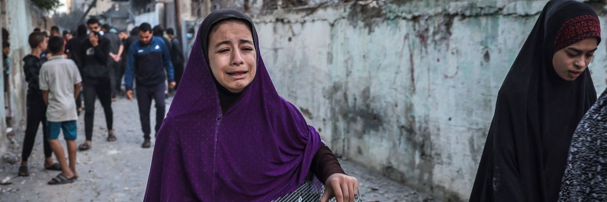 girl flees israeli strike