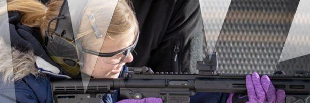 girl holding jr-15 rifle