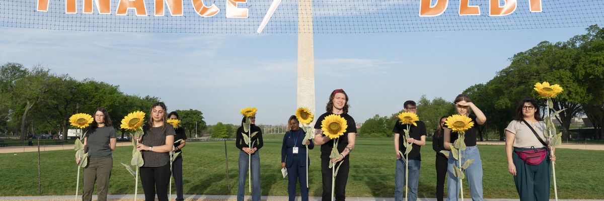 Global activists demonstrate on the first day of the International Monetary Fund-World Bank Group spring meetings