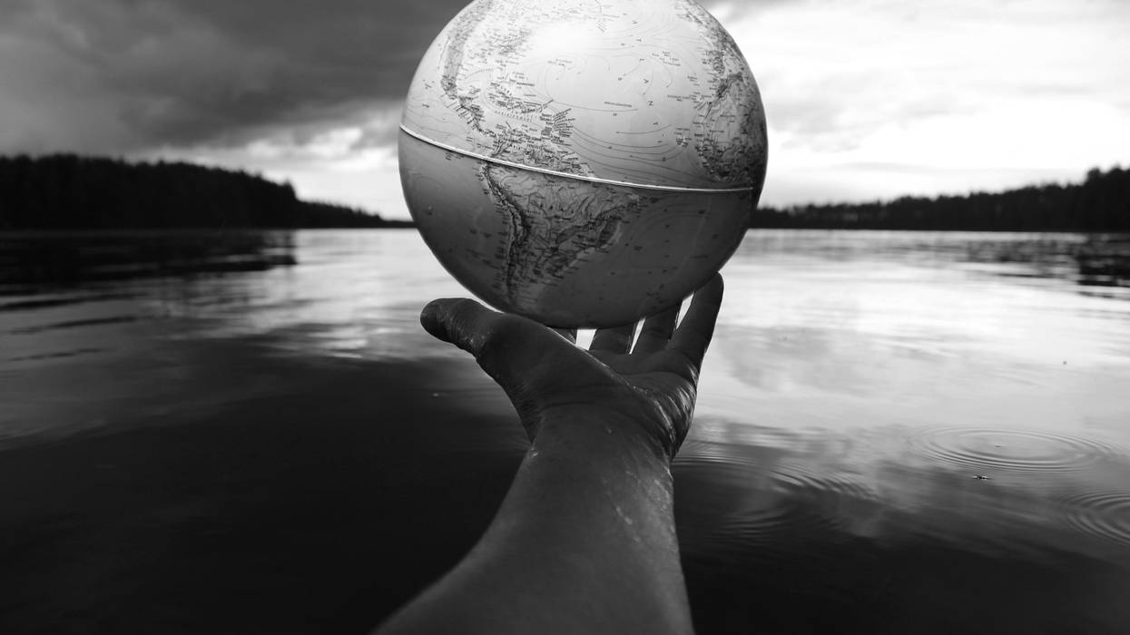 Globe being held in a hand