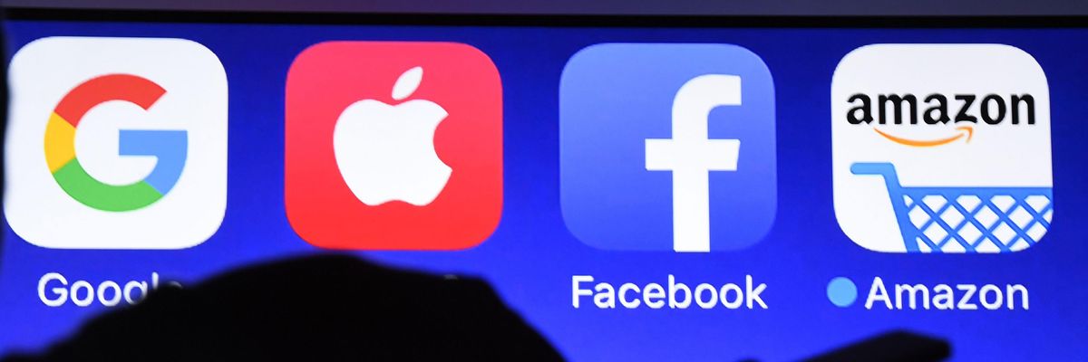 Google, Apple, Facebook, and Amazon logos appear on a phone screen