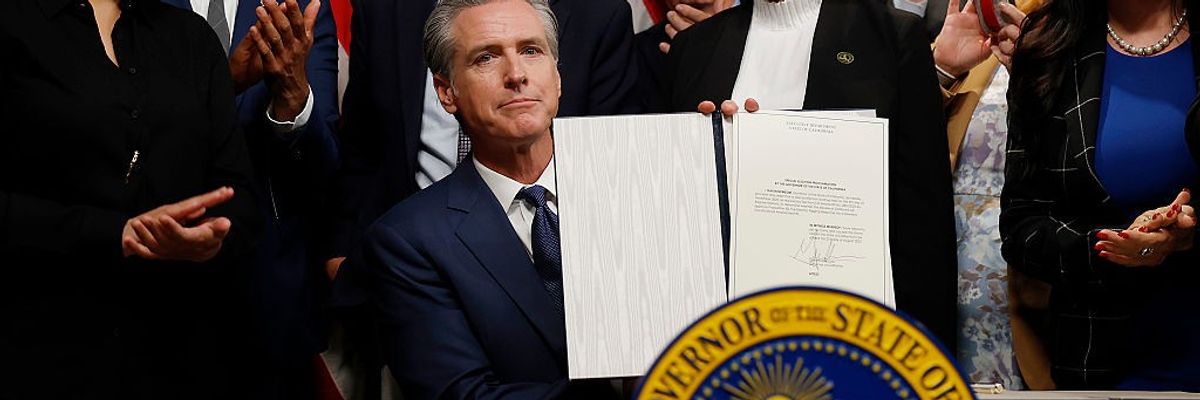 Gov. Gavin Newsom signs a bill putting redistricting on November's ballot