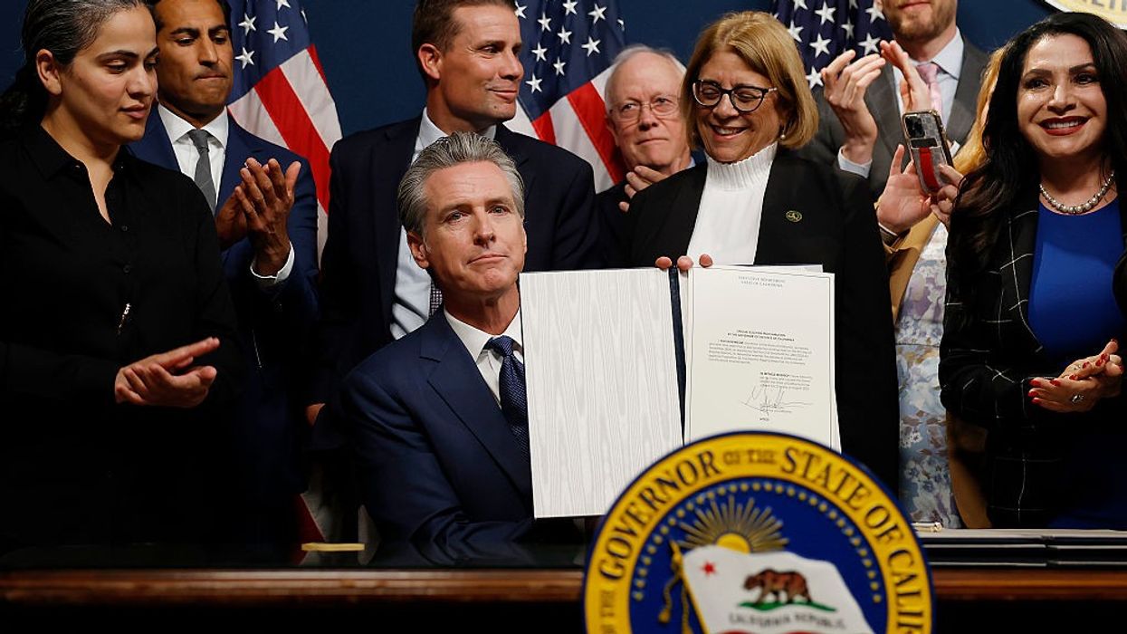 Gov. Gavin Newsom signs a bill putting redistricting on November's ballot