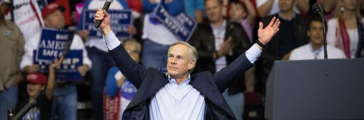 Governor Greg Abbott of Texas with arms raised