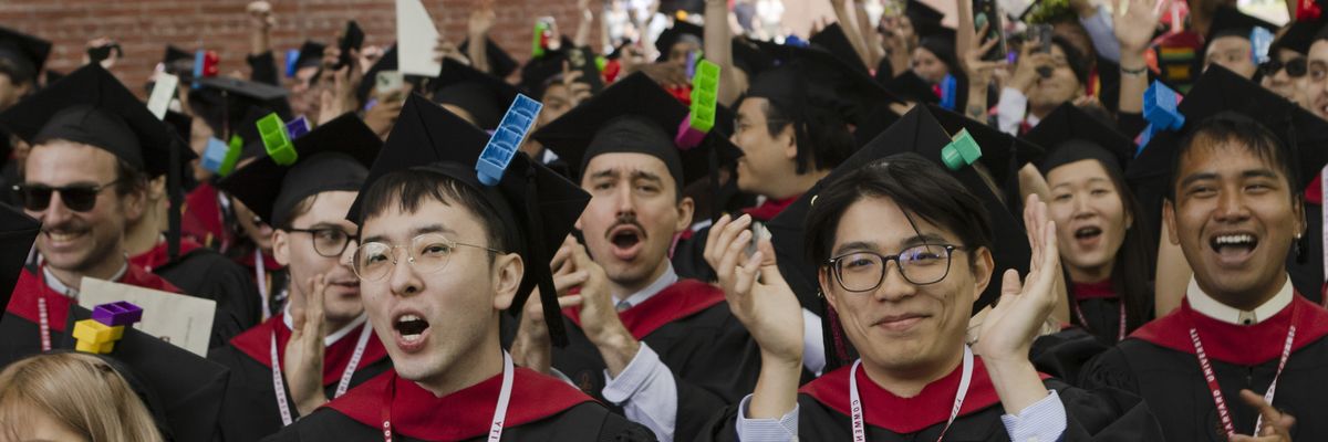 graduates in cap and gowns