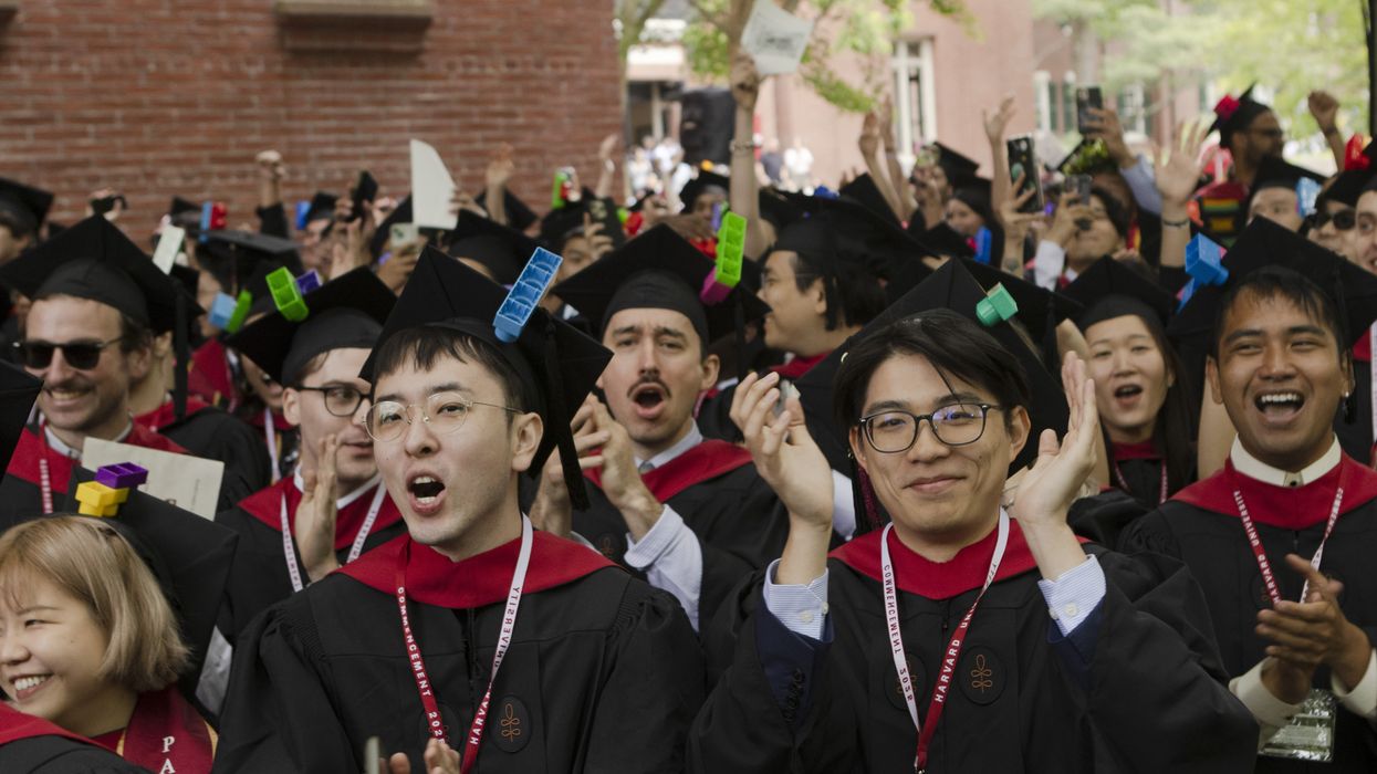 graduates in cap and gowns