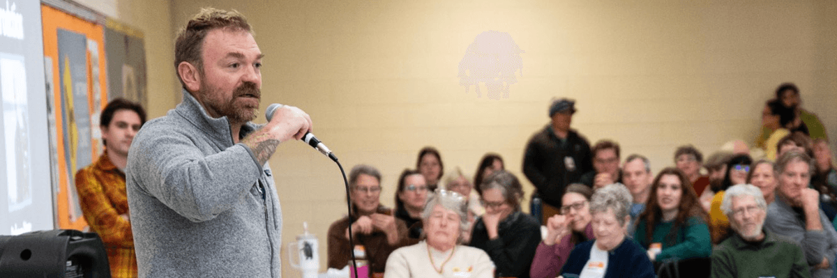 Graham Platner addresses a crowd of Maine voters