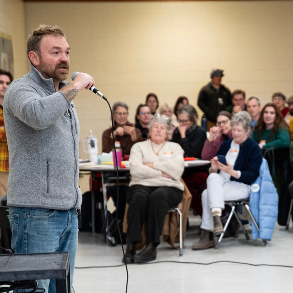 Graham Platner addresses a crowd of Maine voters