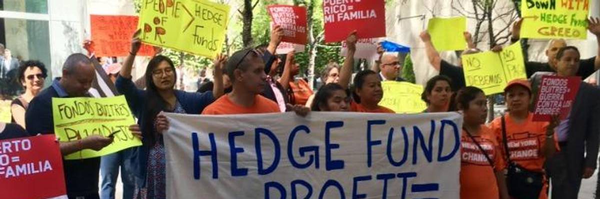 Ripping 'Greedy Wall Street Vulture Funds' Profiting From Misery, Warren and Sanders Introduce Bill to Cancel Puerto Rico's Debt