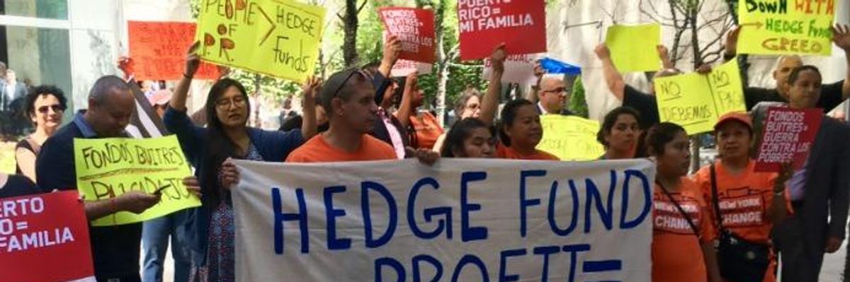 Ripping 'Greedy Wall Street Vulture Funds' Profiting From Misery, Warren and Sanders Introduce Bill to Cancel Puerto Rico's Debt