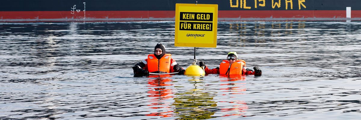 Greenpeace activists block a Russian oil tanker