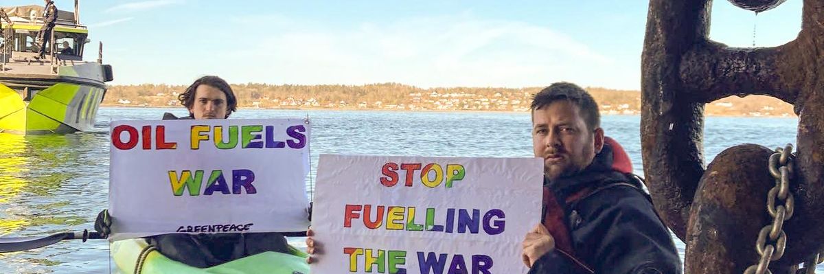 Greenpeace activists block oil tanker