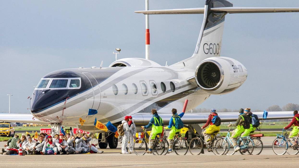 Greenpeace activists block private jet in Amsterdam