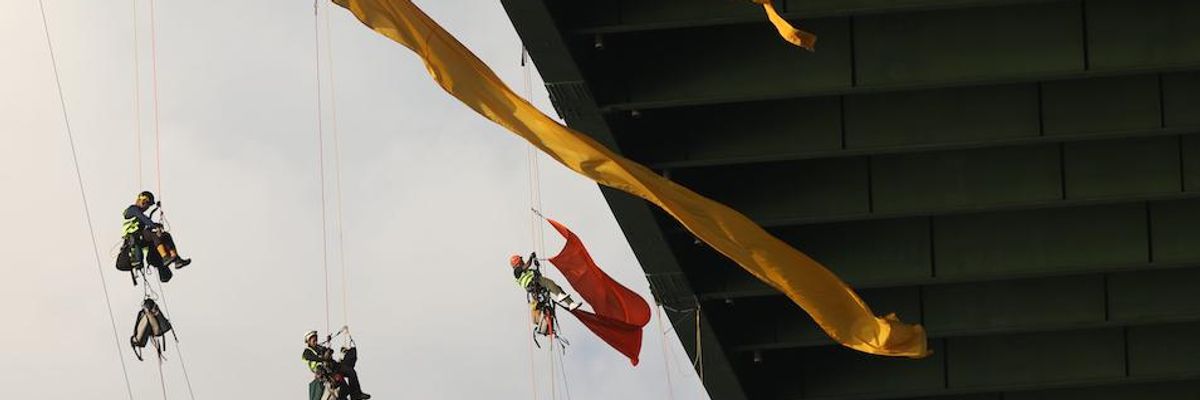 Facing State Felony Charges for Disrupting 'Critical Infrastructure,' Greenpeace Activists Denounce Fossil Fuel 'Bullying Tactic'