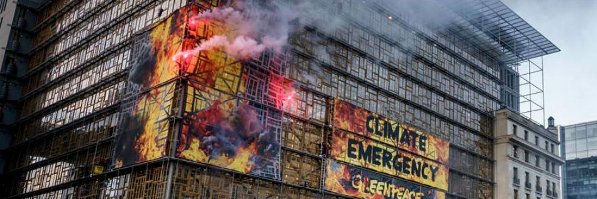 Decrying EU Proposal to Address Climate Crisis by 2050 as 'Too Little Too Late,' Greenpeace Activists Stage #HouseOnFire Demonstration