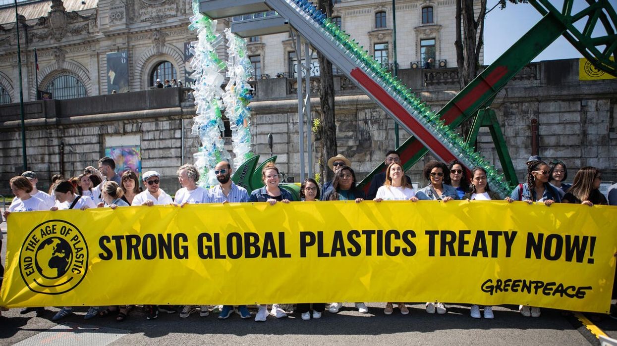 Greenpeace banner demands strong global plastics treaty