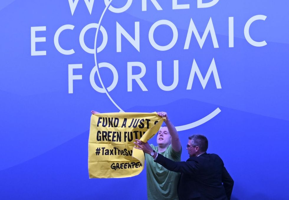 Greenpeace protest at World Economic Forum Congress Center in Davos