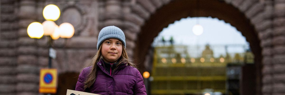 Greta Thunberg attends a protest in front of the Swedish Parliament