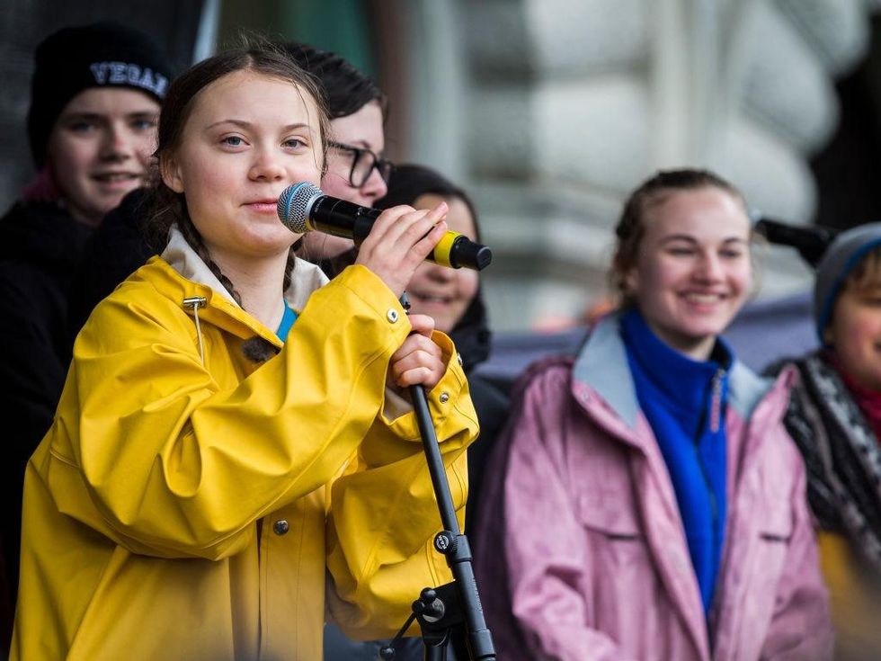 Greta Thunberg participates in a strike outside of the Swedish parliament house, Riksdagen, in order to raise awareness for global climate change on March 15, 2019 in Stockholm, Sweden. (Photo by MICHAEL CAMPANELLA/Getty Images)