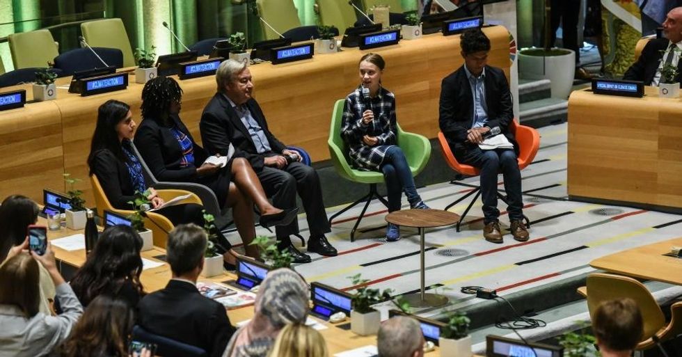 Greta Thunberg speaks while sitting with the other speakers at the event, (L-R) Komal Karishma Kumar, Wanjuhi Njoroge, Antonio Guterres, UN Secretary-General, and Bruno Rodriguez at the first ever United Nations Youth Climate Summit on September 21, 2019 in New York City. (Photo: Stephanie Keith/Getty Images)
