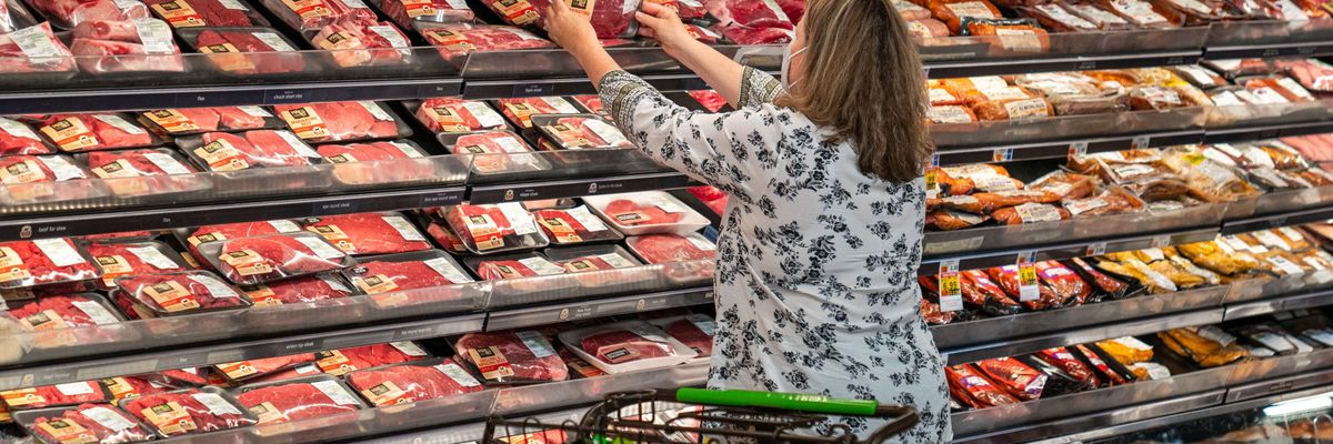 grocery shopper at meat section