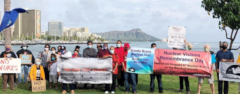 Group photo on magic island cropped lightened midrange image_67205889