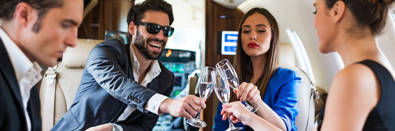 group-toast-aboard-a-private-jet.jpg?id=
