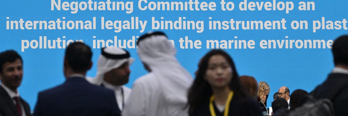 Guests gather prior to the opening of the United Nations Intergovernmental Negotiating Committee on Plastic Pollution
