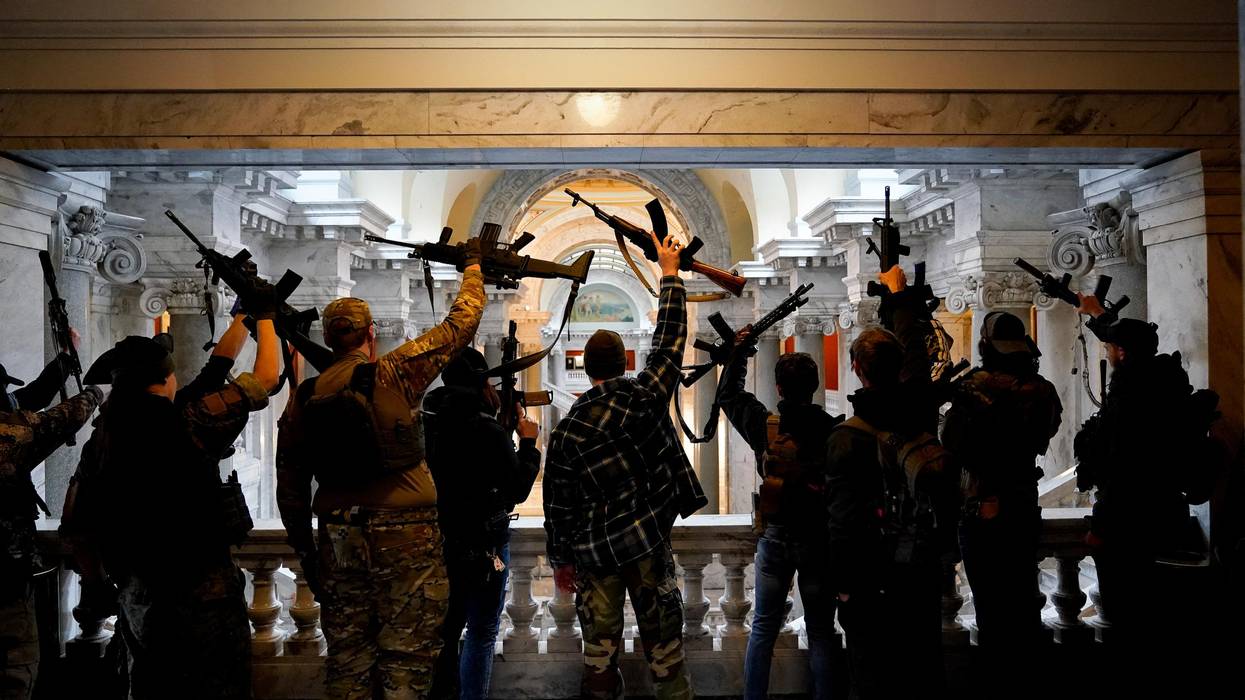 Gun rights activists carrying semi-automatic firearms