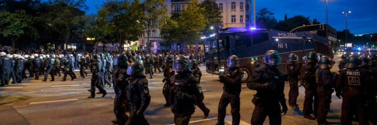 German Police Deploy Water Cannon Against G20 Protesters