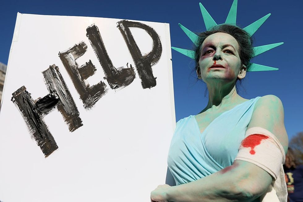 'Hands Off' protest on April 5