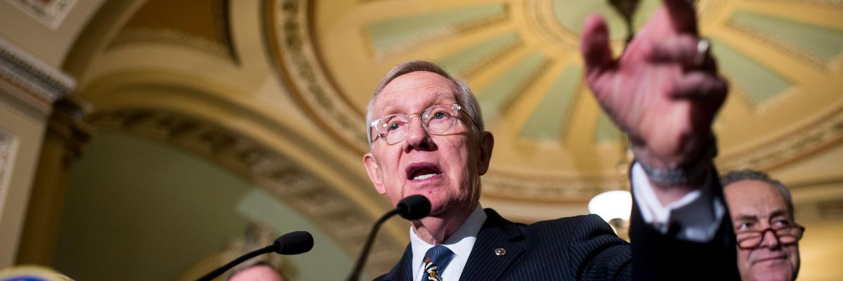 Harry Reid speaks to the press