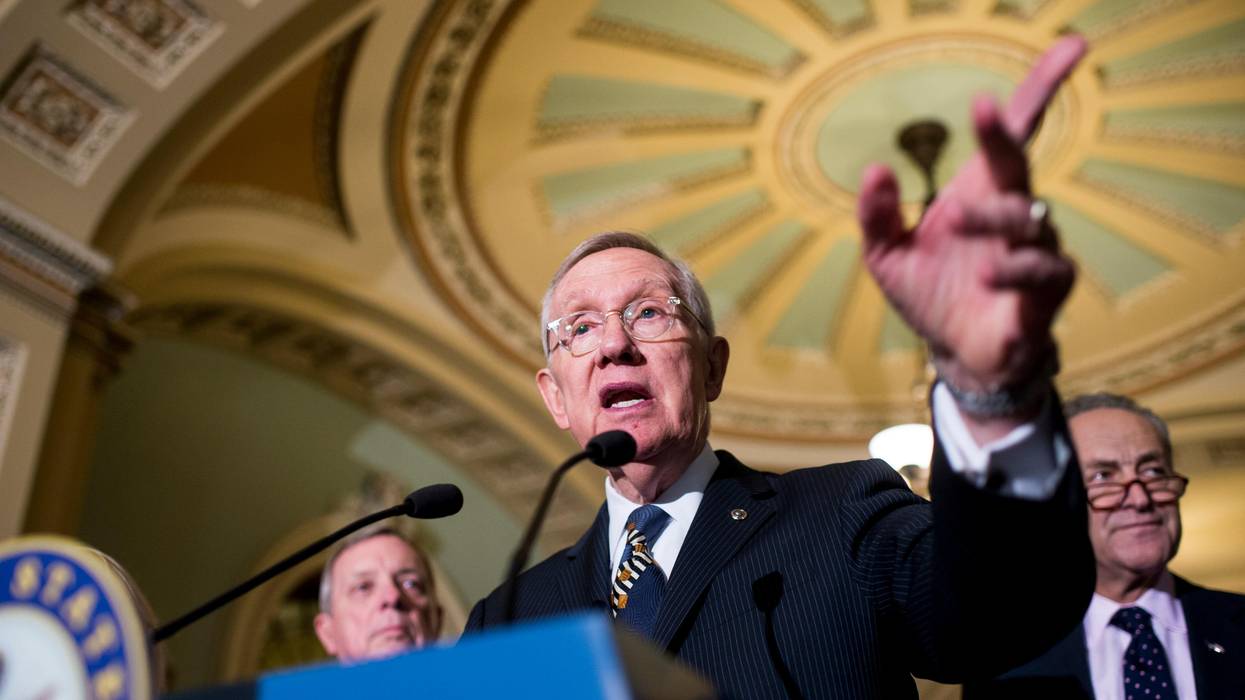 Harry Reid speaks to the press