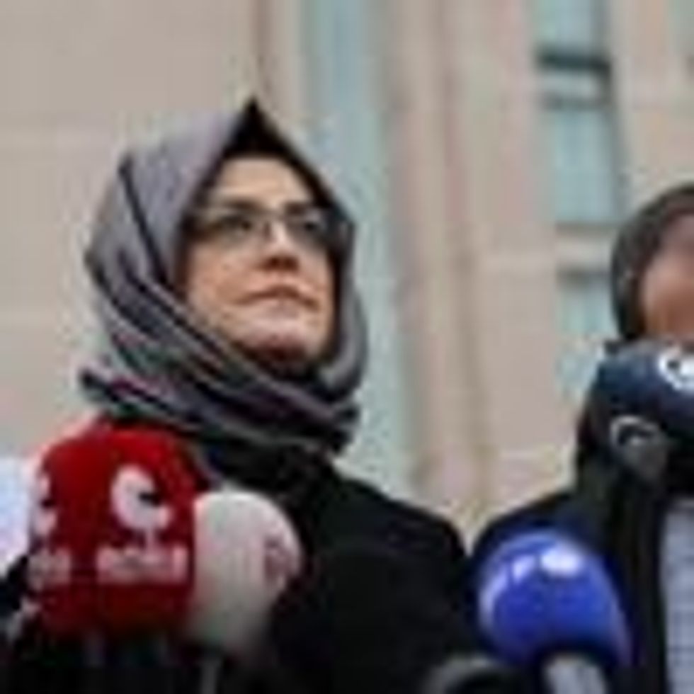 Hatice Cengiz speaks to the press